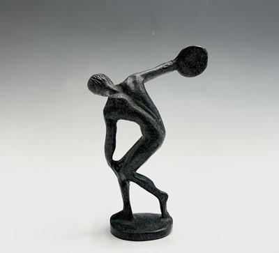 Lot 60 - A small bronze figure of an athlete throwing a...