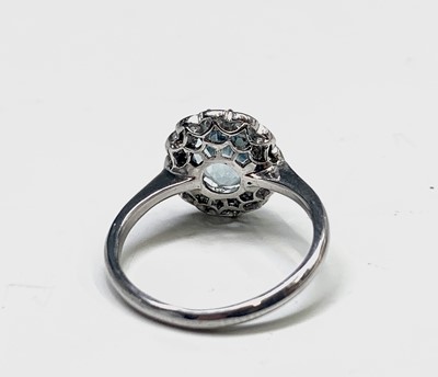 Lot 421 - An 18ct white gold and platinum ring set an...