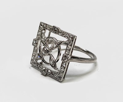 Lot 251 - An unusual white gold or platinum 1920s ring...