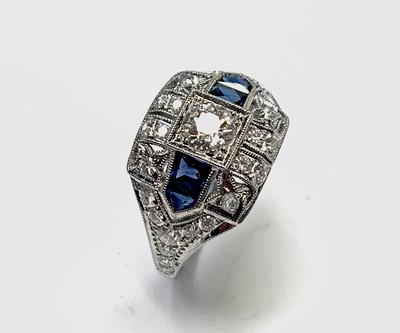 Lot 142 - A Sophia platinum diamond and sapphire ring 4.1gm
