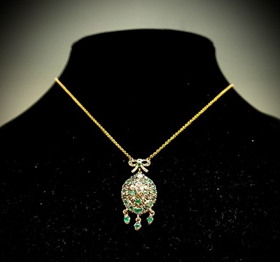 Lot 191 - An emerald and diamond pendant Ht 34.25mm 6gm