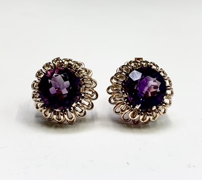 Lot 403 - A pair of high purity 1950s clip-on amethyst...