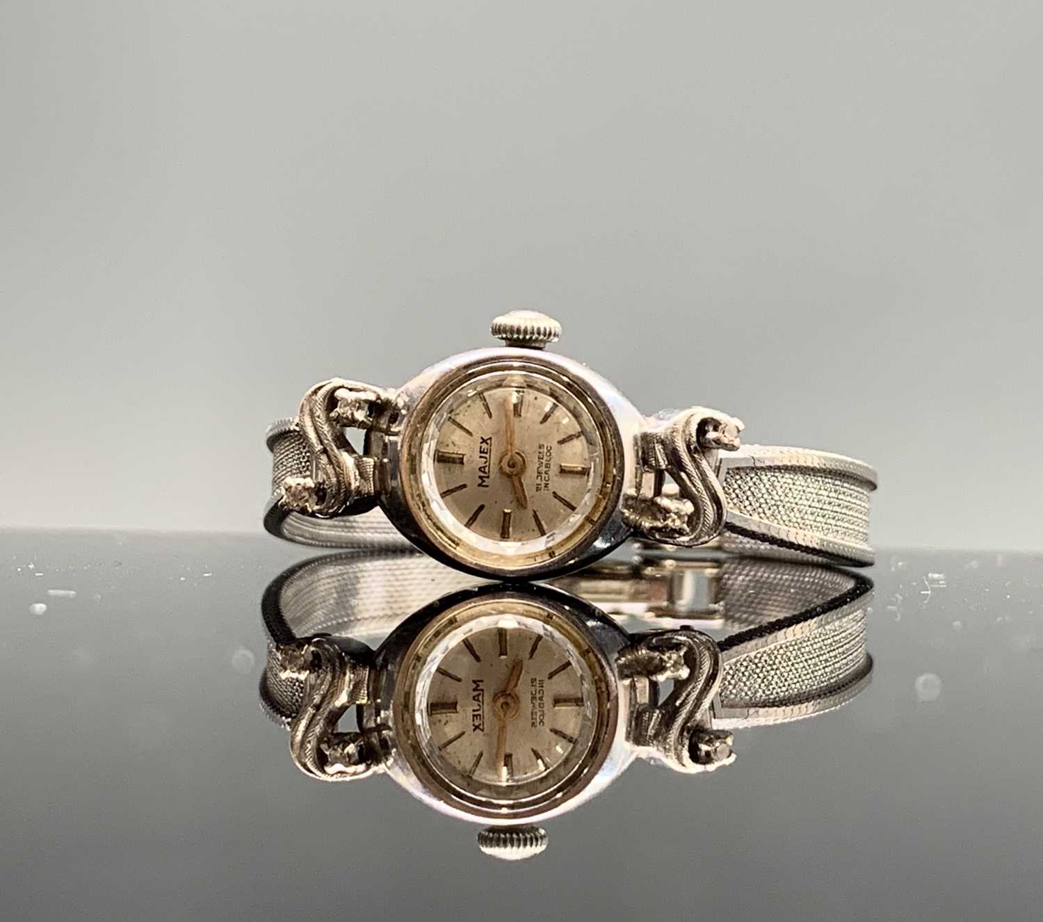 Lot 62 - A 9ct white gold diamond set cocktail watch by...