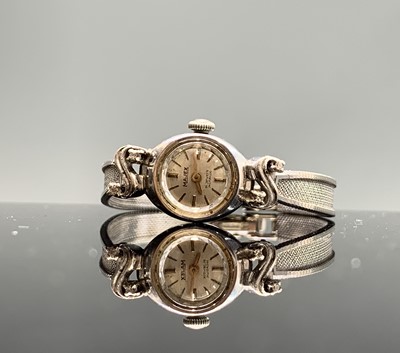 Lot 275 - A 9ct white gold diamond set cocktail watch by...