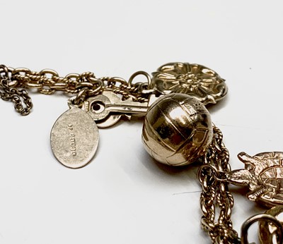 Lot 321 - A 9ct gold charm bracelet 24.3gm