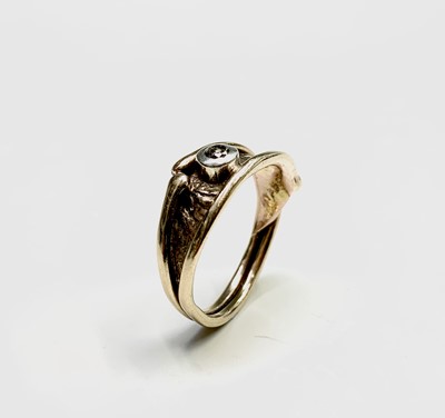 Lot 230 - A 9ct ring by Les Grimshaw set a diamond 3gm