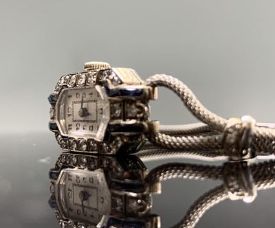 Lot 423 - An Art Deco white gold cocktail watch the...