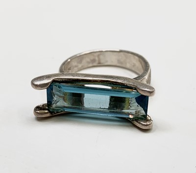 Lot 411 - A silver ring set with an unusually wide...