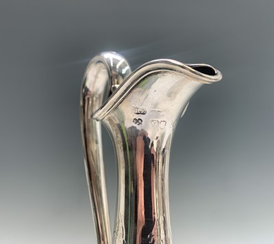 Lot 1000 - An elegant silver wine ewer by Edward & John...