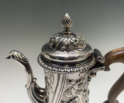 Lot 1006 - A George II coffee pot with wooden handle and...
