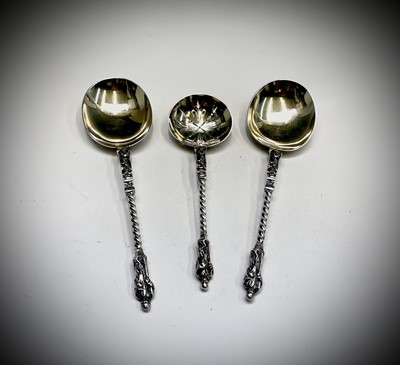 Lot 1077 - A set of three silver & gilt apostle spoons by...