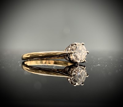 Lot 267 - Diamond set gold solitaire ring Round...