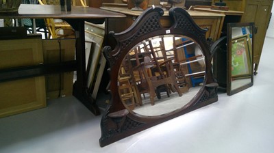 Lot 44 - Oak overmantle mirror with a beveled edge....