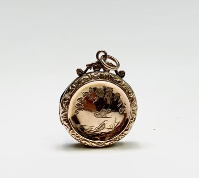 Lot 143 - A 9ct gold bird chased locket and two 9ct gold...