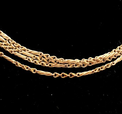 Lot 208 - A 10ct gold long guard with spiral bar links...