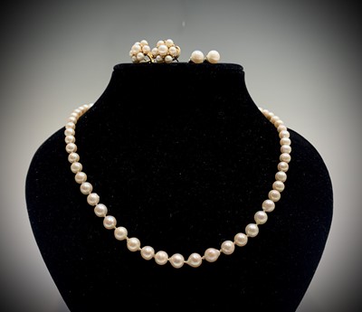 Lot 367 - A cultured pearl necklace, 50cm, with a pretty...