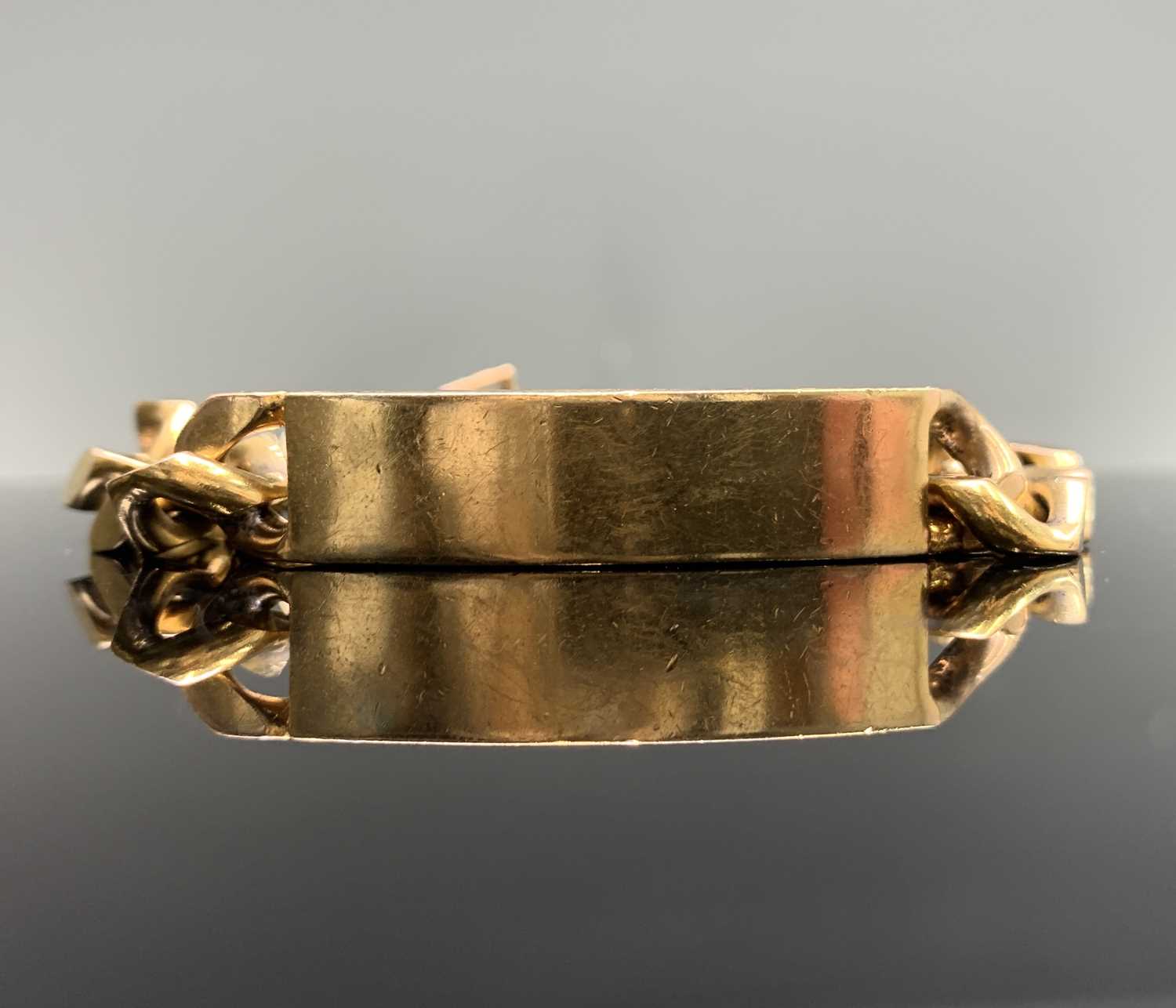 Lot 436 - A 9ct gold identity bracelet 75.4gm