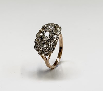 Lot 114 - A Victorian style oval diamond ring set in...