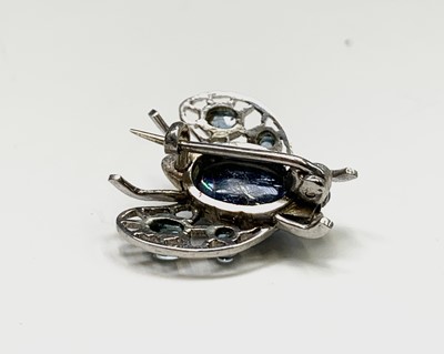 Lot 270 - A small white gold fly brooch the body a...