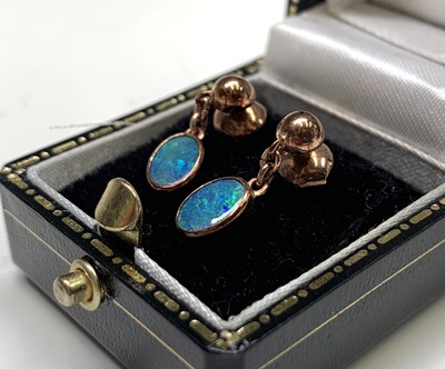 Lot 224 - Two pairs of opal earrings set in gold 3.2gm