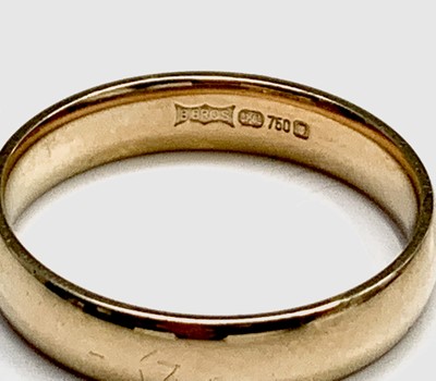 Lot 249 - An 18ct gold band 3.9gm and a 9ct gold dress...