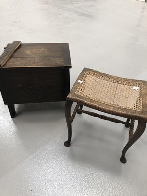 Lot 95 - A oak bergere stool and a oak sewing/work...