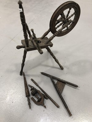 Lot 104 - Spinning wheel.