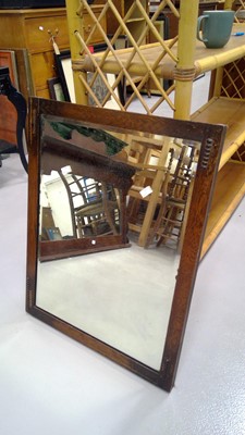 Lot 70 - Mahogany wall hanging mirror with a beveled...