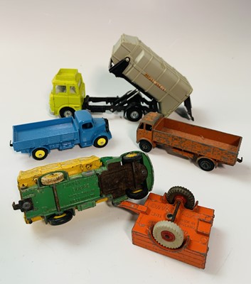 Lot 702 - Dinky Toys - A box containing mainly early...