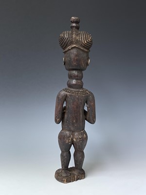 Lot 181 - A carved wood South Sea island figure. Height...