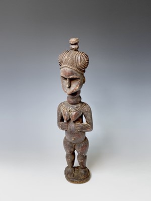 Lot 181 - A carved wood South Sea island figure. Height...