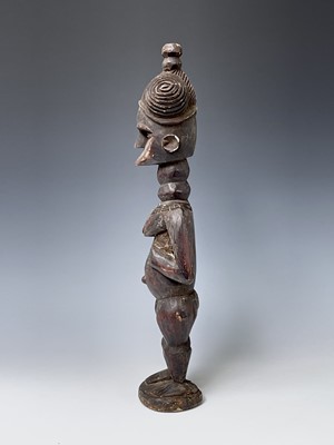 Lot 181 - A carved wood South Sea island figure. Height...