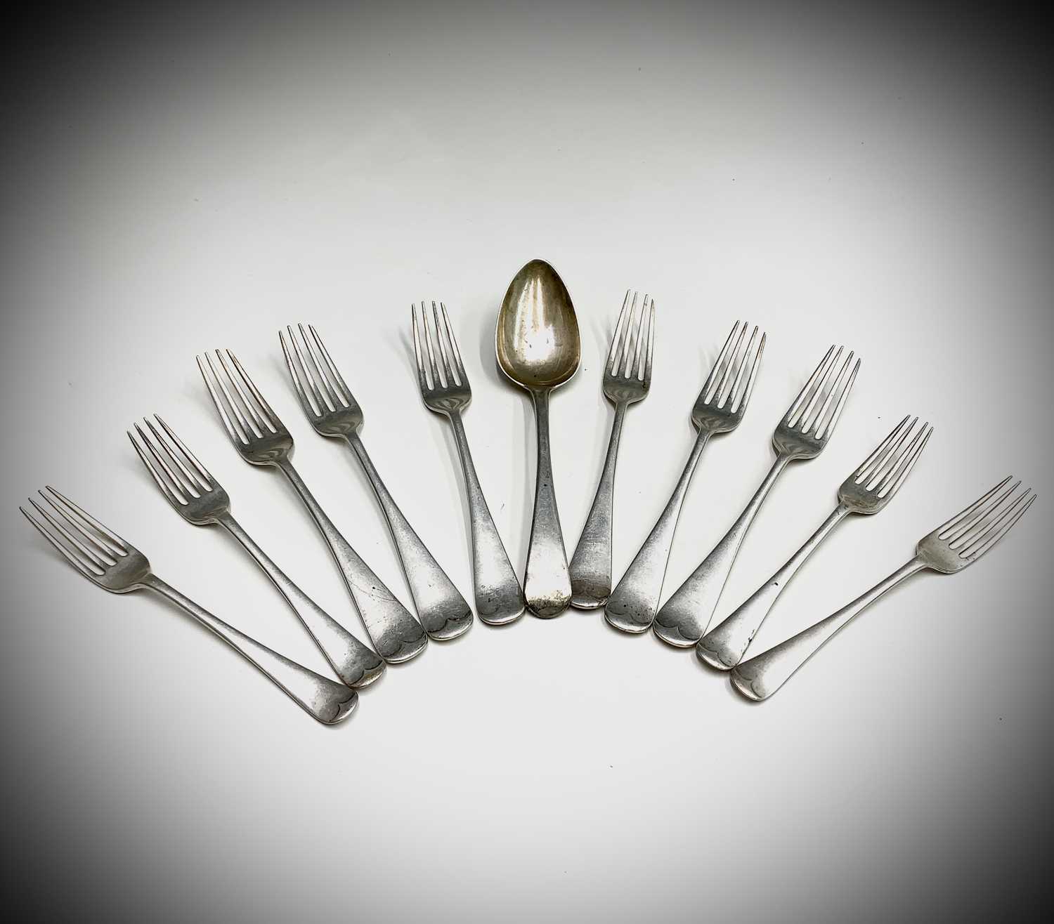 Lot 1057 - A set of six Old English pattern table forks...