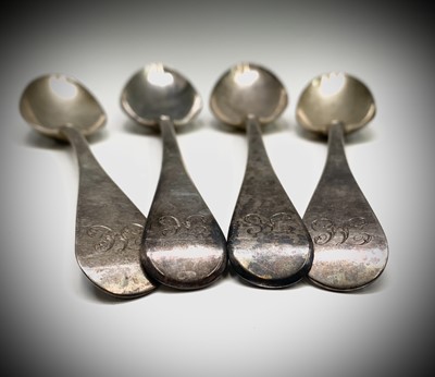 Lot 1082 - Four Georgian Old English pattern table spoons...