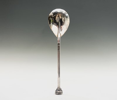 Lot 1073 - A modern Guild of Handicrafts silver spoon in...