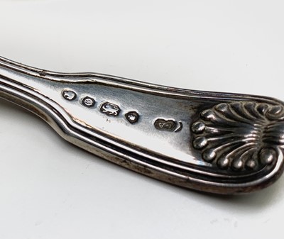 Lot 1044 - Three Victorian silver caddy spoons: Henry...