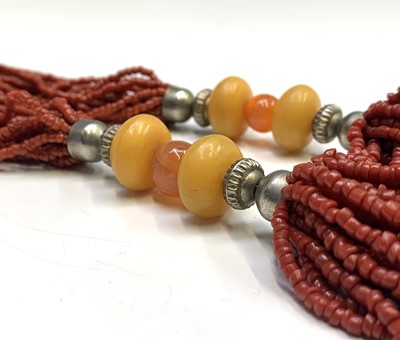 Lot 318 - A coral and imitation amber necklace.