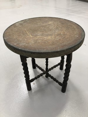 Lot 118 - Brass Benares style table on folding base,...
