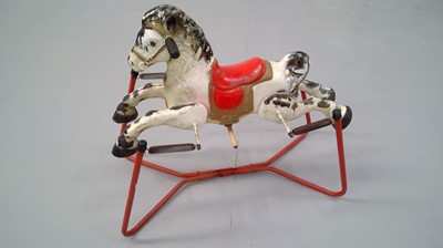 Lot 150 - Vintage tin "Mobo prairie king" rocking horse.