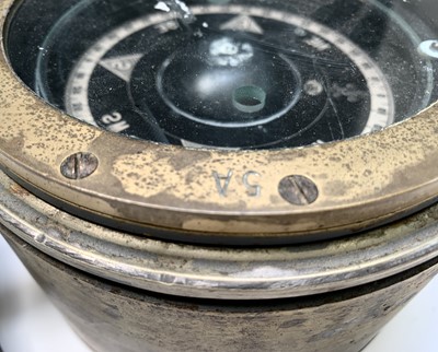Lot 49 - A brass ship's compass, stamped to the edge...