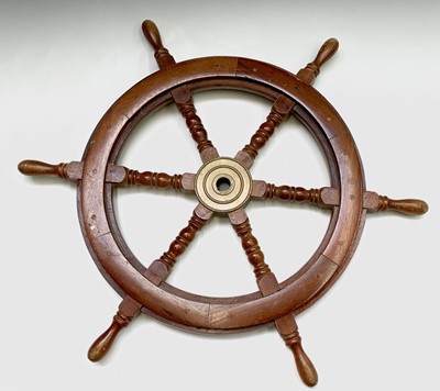 Lot 50 - A brass mounted mahogany ship's wheel, mid...