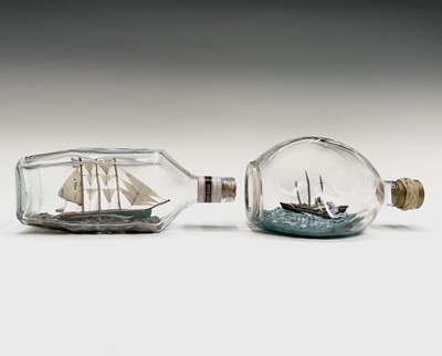 Lot 68 - A model three masted ship in a bottle, length...