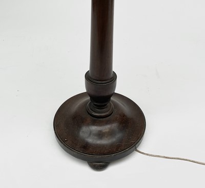 Lot 3072 - A mahogany standard lamp, 1920s, in the style...