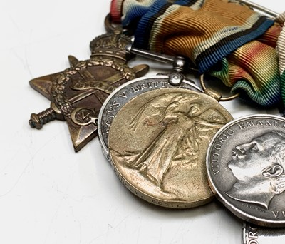 Lot 211 - Group of five:- First World War trio K15652...