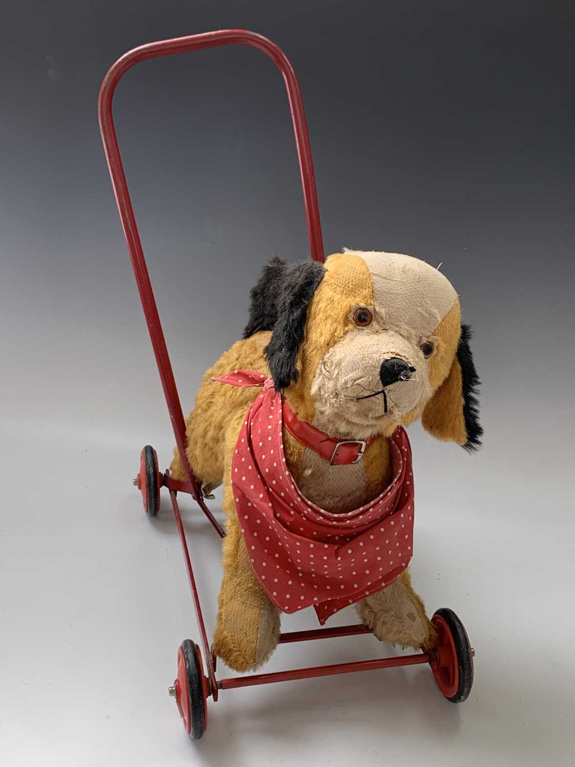 Lot 765 Chiltern Toys Push Along Dog A somewhat