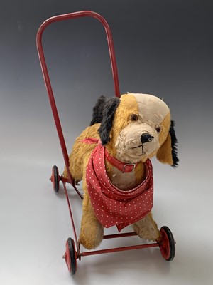 Lot 765 - Chiltern Toys Push Along Dog - A somewhat...