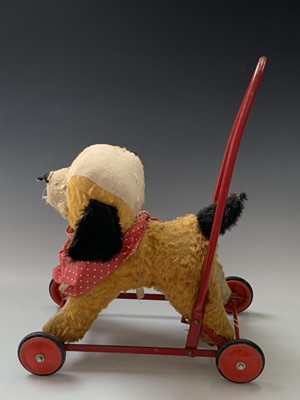 Lot 765 - Chiltern Toys Push Along Dog - A somewhat...