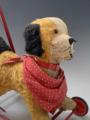 Lot 765 - Chiltern Toys Push Along Dog - A somewhat...