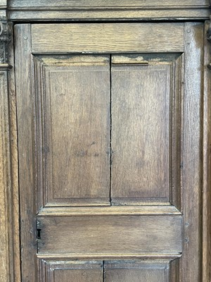 Lot 6 - A Continental oak hall cupboard, late 18th...