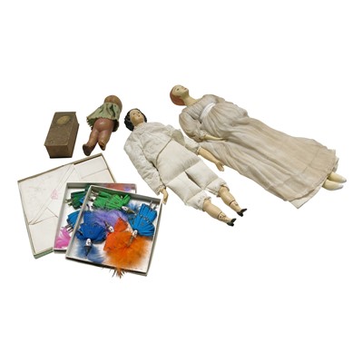 Lot 100 - Three wooden hand-painted dolls, together with...